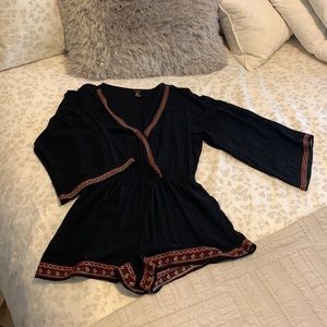 Black romper with beautiful, trim, maroon and gold